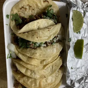 Steak tacos with cilantro and onion