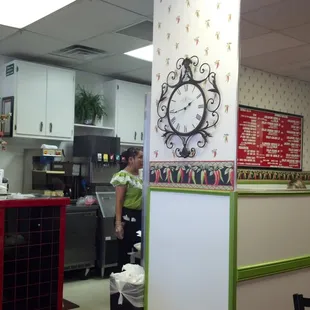 a man standing in a restaurant