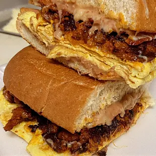 Breakfast Torta. Your choice bacon, sausage, bacon &amp; sausage, chorizo, and machaca. Pictured bacon and pastor breakfast torta