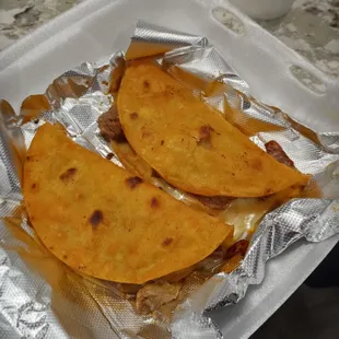 Dry ass quesabirria tacos. They didn&apos;t give me consome.