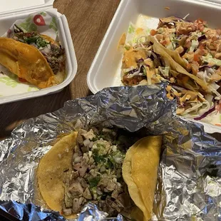 The Governador, pescado empanizado, and quesabirria tacos on the top. Asada and chicken tacos on the bottom.