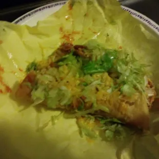 Half of taco shell completely missing.
