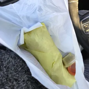 a hot dog wrapped in a bag