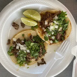 Carne asada and barbacoa tacos.