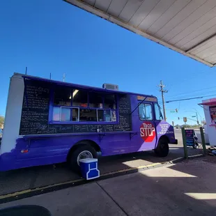 a blue and white food truck