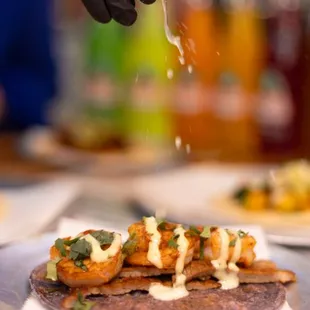 Surf N Turf taco in a blue corn tortilla