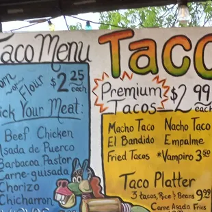The rest of the menu board with individual street tacos at $2.25