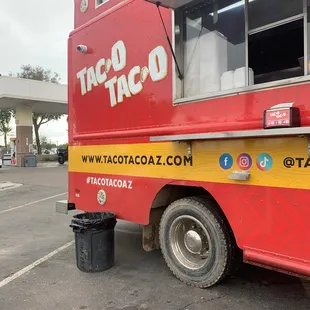 a taco truck parked in a parking lot