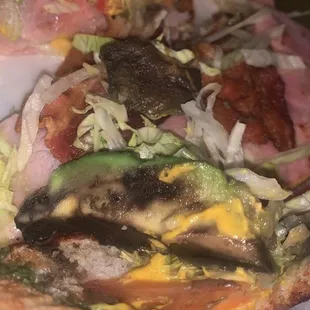 a close up of a taco taco pizza