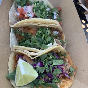 Tacos! Chicken Tinga, Beef Guisado, and Pork carnitas. At iron district.
