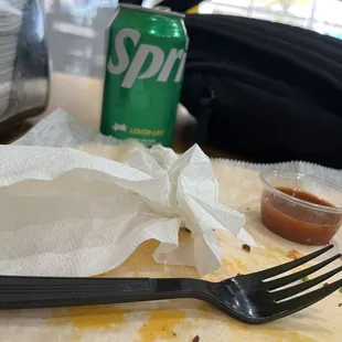 Marinated pork tacos I finished. Sprite, Limes, spicy taco sauce.