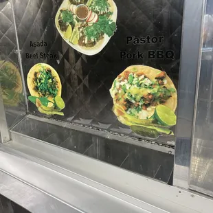 a variety of tacos on display