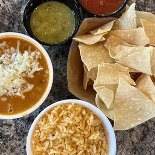 Side of beans, side of rice and chips and salsa from the salsa bar