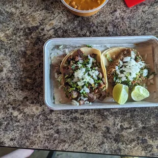 Lengua and chorizo tacos