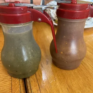 The green salsa is not spicy, red is hot