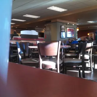 Lobby of taco time plus a compostable cup.