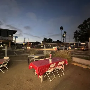 a table with a red table cloth on it