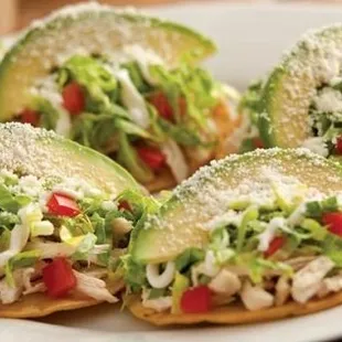 a plate of tacos on a table