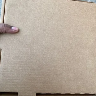 Box containing the El Biggo Nachos Tray