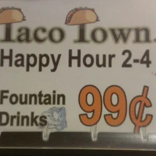 a sign for happy hour