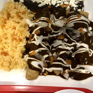 Tinga Enchilada with mole sauce. I LOVE the spicy sauce that they add on side