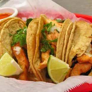 Tinga de Pollo Tacos! Corn tortilla &amp; your choice of meat, cilantro &amp; onions or pico de gallo. Served with rice &amp; beans.