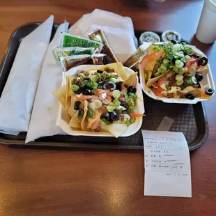 Small beef super nacho, tacos and bean burritos