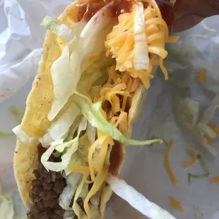 Hard shell ground beef taco. I add taco sauce. Yum!