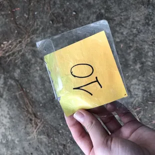 a yellow sticker with the number 70