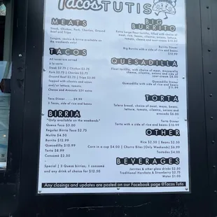 a menu on the side of a truck