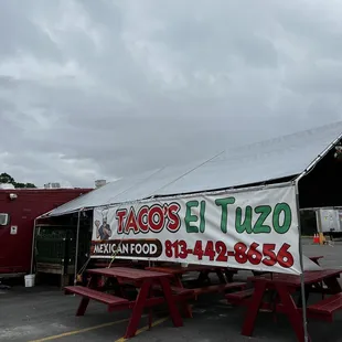 a taco truck parked in a parking lot