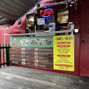 a food truck with menus