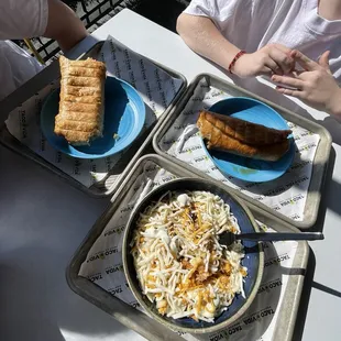 Two beef chimichangas and a chicken bowl