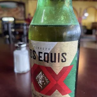 a bottle of beer on a table