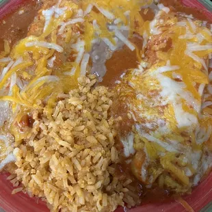 Enchilada and Tamale plate w rice and beans