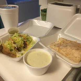 Beef tacos, cheese quesadilla with tomato and onion, side of queso cheese dip and diet coke