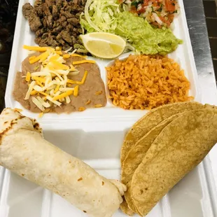 Carne asada plate combo #12   Served with beans and rice,steak,lettuce, guacamole,pico de Gallo and your choice of corn or flower tortilla