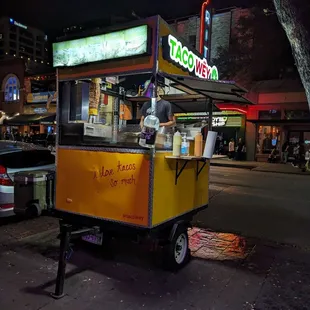 a food cart on a city street