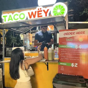 a woman ordering a drink