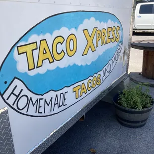a taco express truck parked in a parking lot