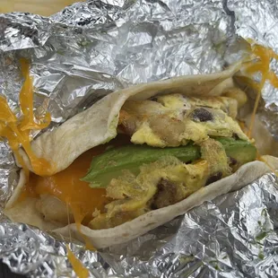 Potatoes, Egg and Cheese Taco w/ avocado