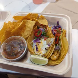 Fish taco and shrimp taco special with guava soda