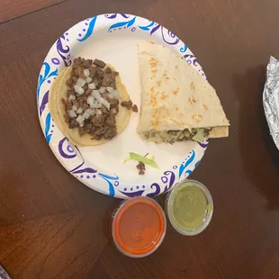 Asada taco and quesadilla with red or green chili.