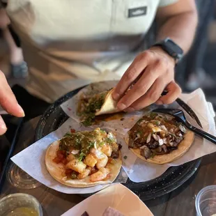 a person eating a taco