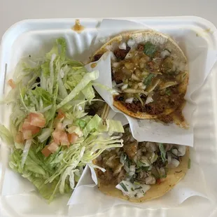 vegetarian taco (left), chorizo taco (top), and carnitas taco (bottom)