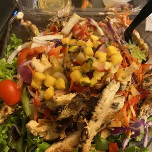 a salad in a plastic container