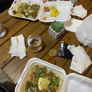 a table full of food and drinks