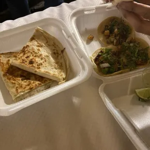 Bought 3 orders of tacos at 10 dollars but this quesadilla dont look 10 dollars as we were charged 40+