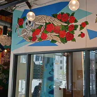 a mural on the wall of a restaurant
