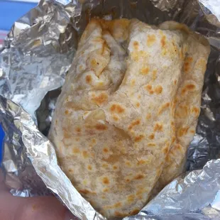 a burrito wrapped in foil